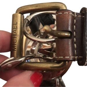 Micheal Kors size  XL orange / rust genuine leather with brass studs 1.5” 43-“